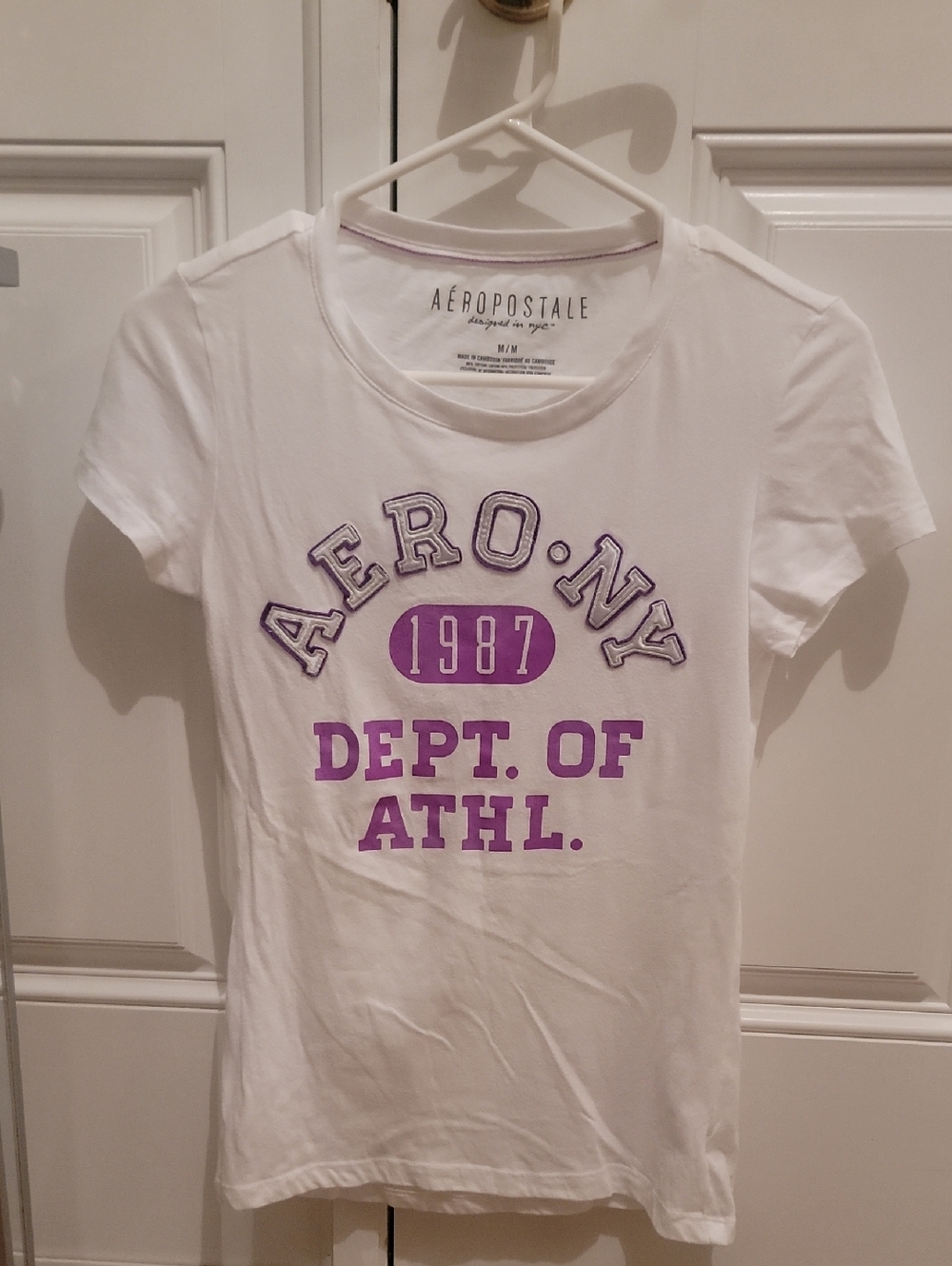 Aeropostale Tee. White W/ Pink Shiny Lettering. Silver Sparkle Stitching. Med.